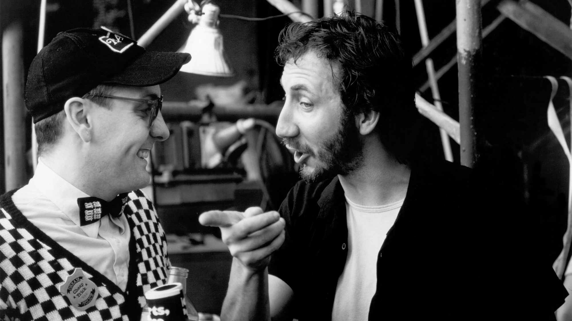 CIRCA 1980: Guitarists Rick Nielsen of the rock and roll band &quot;Cheap Trick&quot; and Pete Townshend of the rock and roll band &quot;The Who&quot; have a meeting of the minds in circa 1980.
