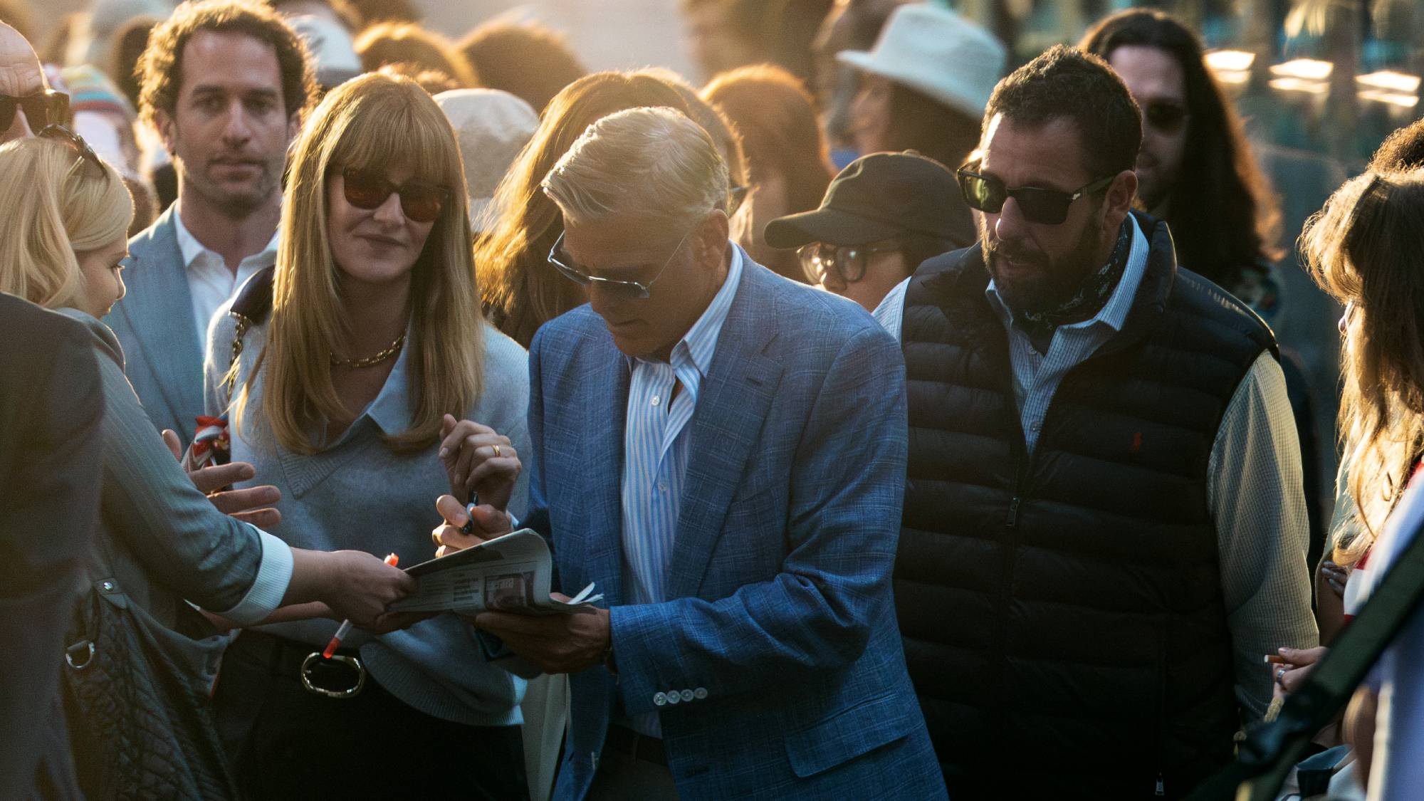 (L-R) Laura Dern as Liz, George Clooney as Jay Kelly and Adam Sandler as Ron Sukenick in &quot;Jay Kelly&quot;