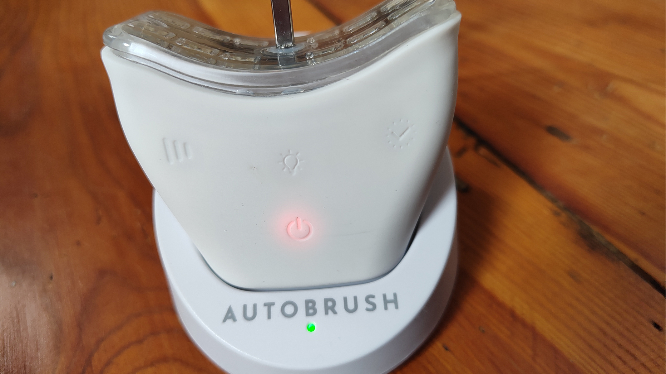 The AutoBrush Sonic Pro in its charging dock.