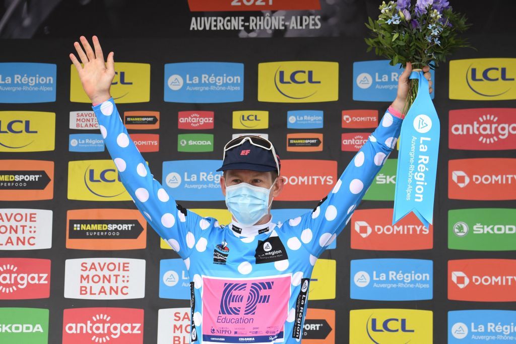 Team Education Firsts Lawson Craddock of US celebrates his best climbers polka dot jersey on the podium at the end of the seventh stage of the 73rd edition of the Criterium du Dauphine cycling race a 171km between SaintMartinLeVinoux and La Plagne on June 5 2021 Photo by Alain JOCARD AFP Photo by ALAIN JOCARDAFP via Getty Images