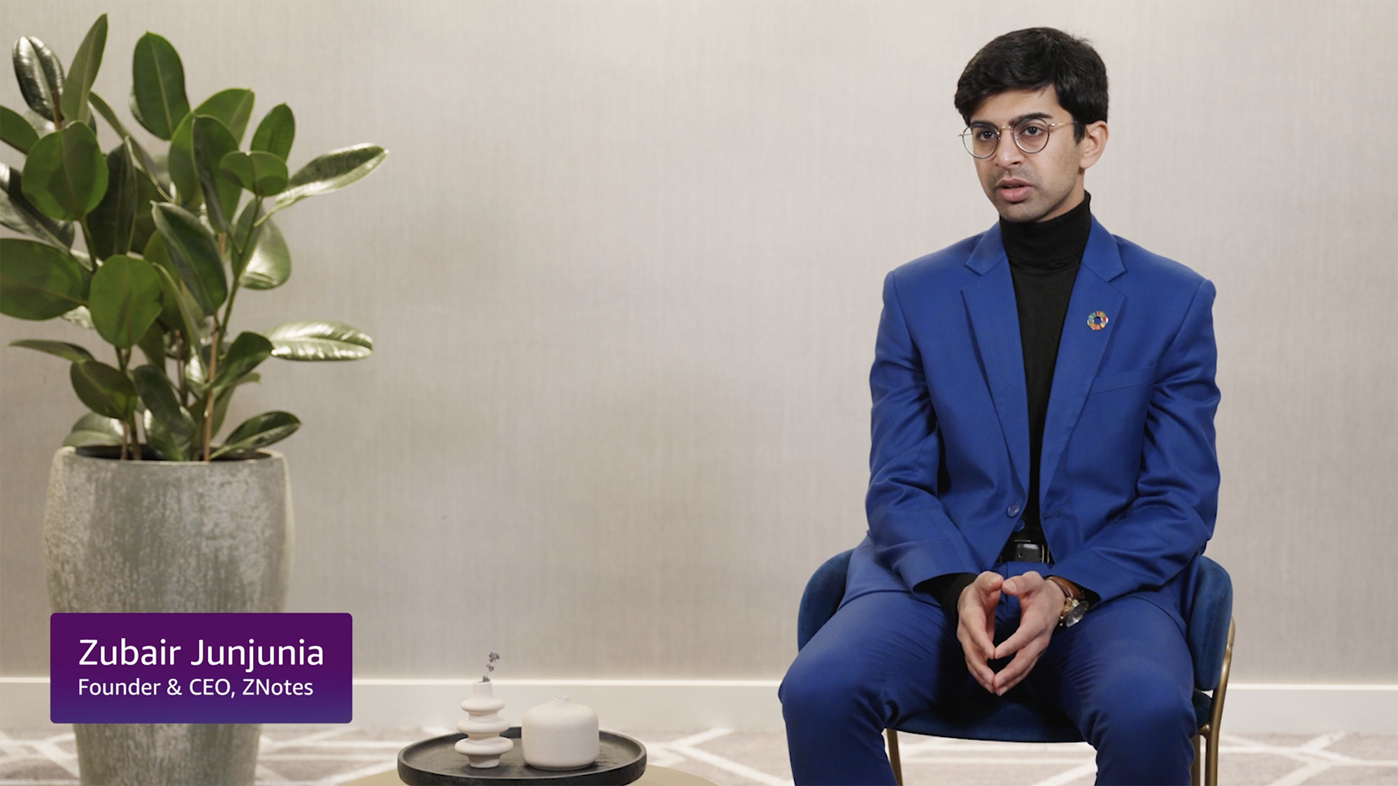 A still from a video of Zubair Junjunia, founder and CEO of Znotes, talking about his company's experience with AWS