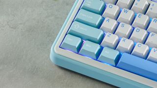 A white and blue Epomaker TH99 96% mechanical keyboard