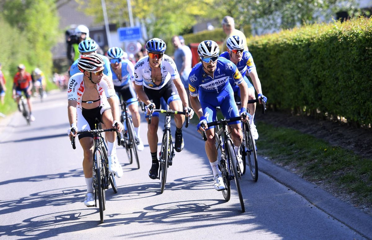 Julian Alaphilippe attacks with Matteo Trentin on his wheel