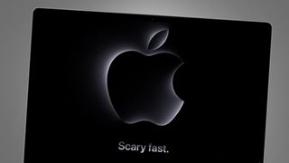 A MacBook Pro on a grey background showing the Apple October 2023 event teaser