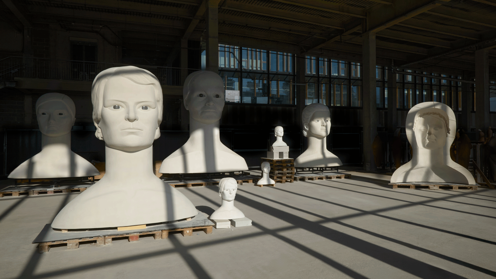 white plaster busts