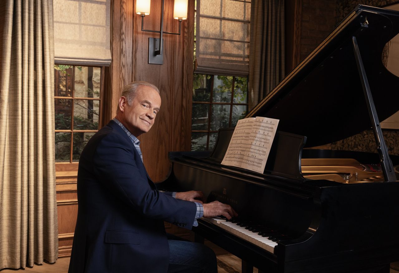 Kelsey Grammer sitting at a grand piano as Frasier Crane in the reboot of the TV show &amp;#039;Frasier&amp;#039;