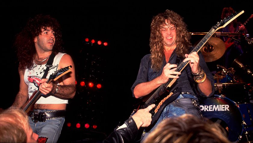 Paul Taylor and Reb Beach, both of the group Winger, perform onstage at the Poplar Creek Music Theater, Hoffman Estates, Illinois, July 27, 1989. 