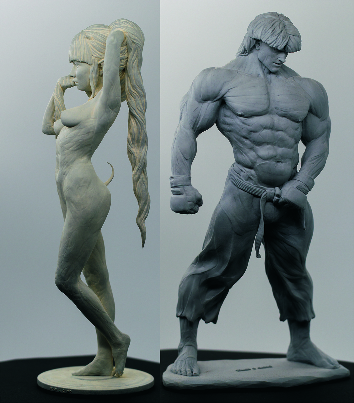 Sculptures of a male and female character