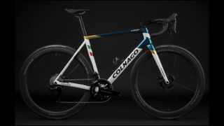 A white, blue and gold Colnago C68 on a black background