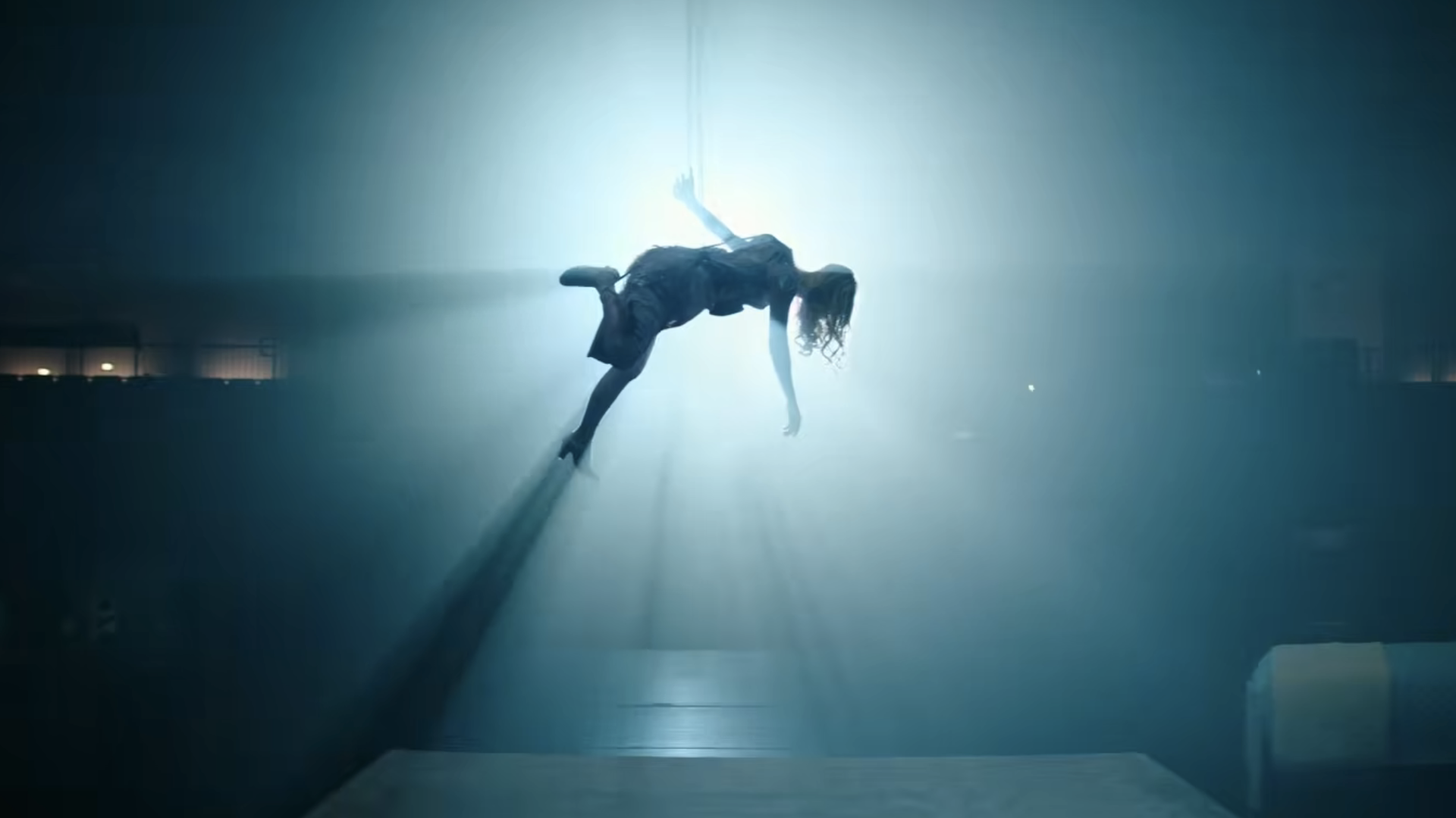 girl hanging on stage in Scream 7