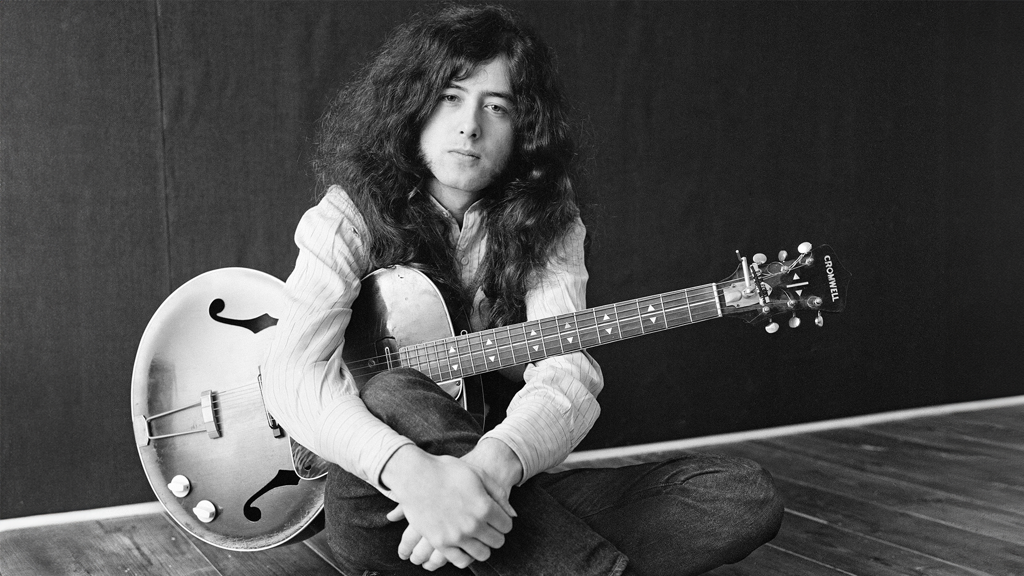 English musician, songwriter, and record producer Jimmy Page, who achieved international success as the guitarist and founder of the rock band Led Zeppelin, at his new Thameside house at Pangbourne, Berkshire, January 1970.