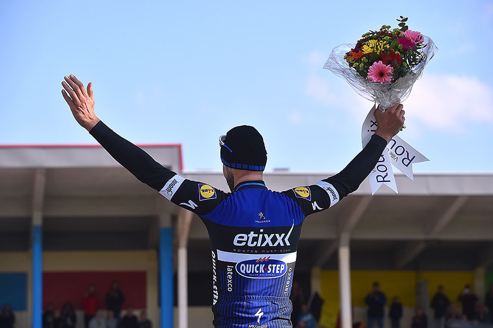 Tom Boonen waves on the podium