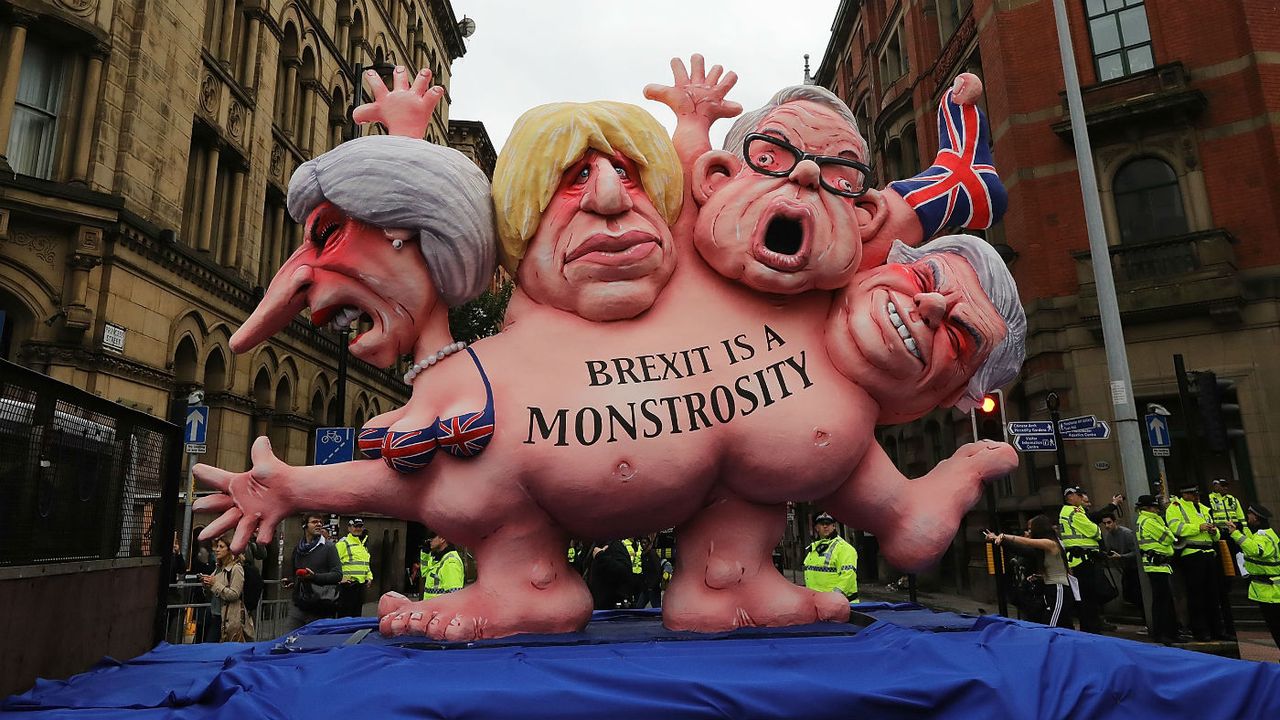  A model of Theresa May and Boris Johnson and other Conservative MP&amp;#039;s is displayed as anti-Brexit rally in Manchester