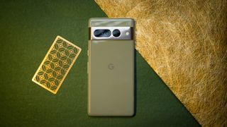 Google Pixel 7 Pro back view straight on angle against green background