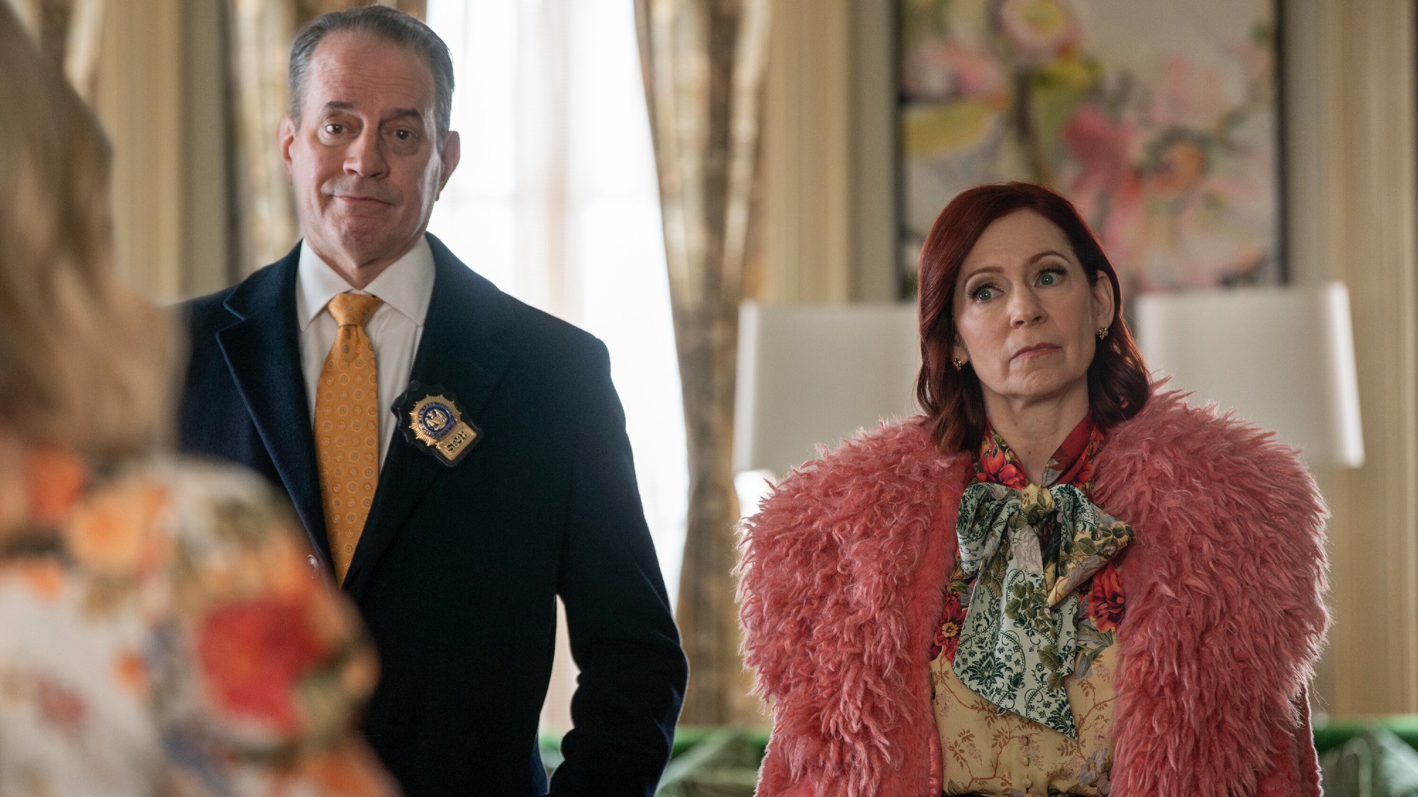 Pictured L to R: Danny Mastrogiorgio as Detective Smullen and Carrie Preston as Elsbeth Tascioni.
