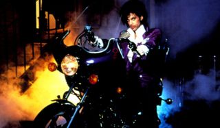 Purple Rain Prince on his motorcycle in the alley