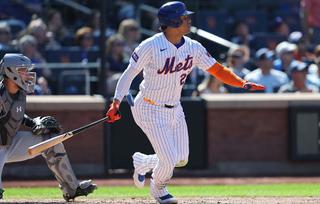 NEW YORK, NEW YORK - AUGUST 31: Juan Soto #22 of the New York Mets singles during the game against the Miami Marlins at Citi Field on August 31, 2025 in New York City. (Photo by Vincent Carchietta/Getty Images)