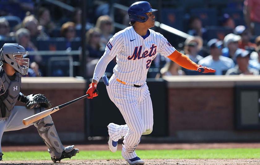 NEW YORK, NEW YORK - AUGUST 31: Juan Soto #22 of the New York Mets singles during the game against the Miami Marlins at Citi Field on August 31, 2025 in New York City. (Photo by Vincent Carchietta/Getty Images)