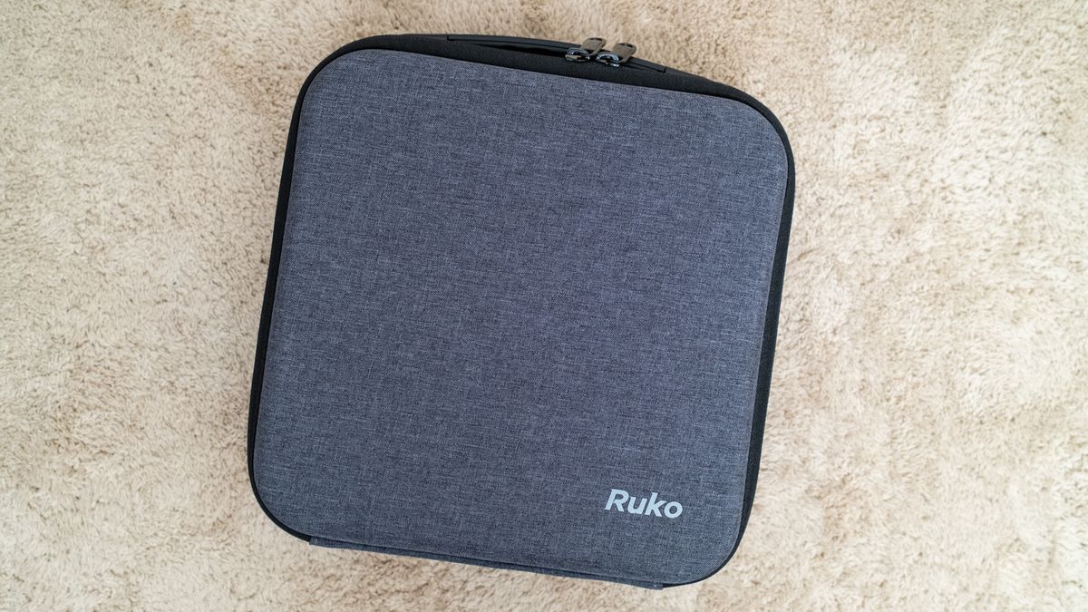 Ruko F11PRO 2 case on a carpet