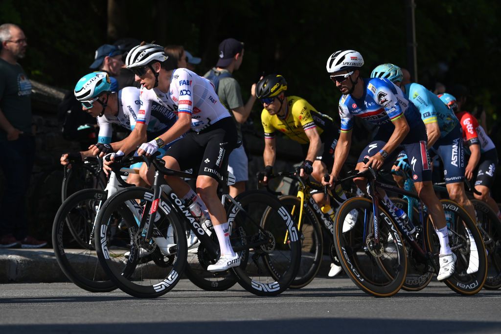 QUEBEC CITY QUEBEC SEPTEMBER 13 LR Tadej Pogacar of Slovenia and UAE Team Emirates and Julian Alaphilippe of France and Team Soudal QuickStep compete during the 13th Grand Prix Cycliste de Quebec 2024 a 2016km one day race from Quebec City to Quebec City UCIWT on September 13 2024 in Quebec City Quebec Photo by Alex BroadwayGetty Images