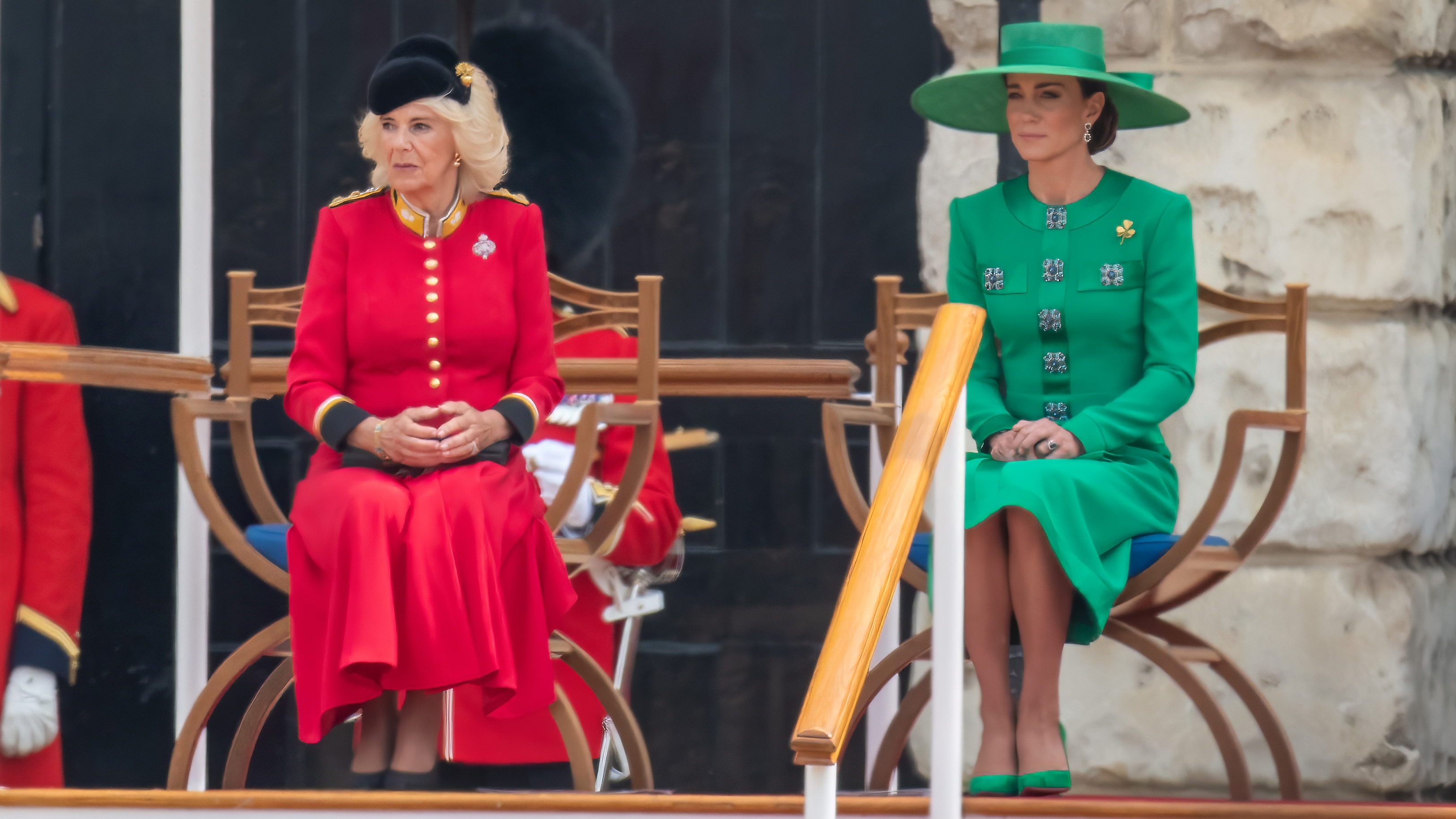 Queen Camilla and Catherine, Princess of Wales sit and observe during Trooping the Colour on June 17, 2023
