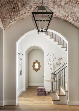 a bright open entryway in a classic home