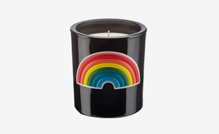 Washing powder candle, with a rainbow on it, by Anya Hindmarch