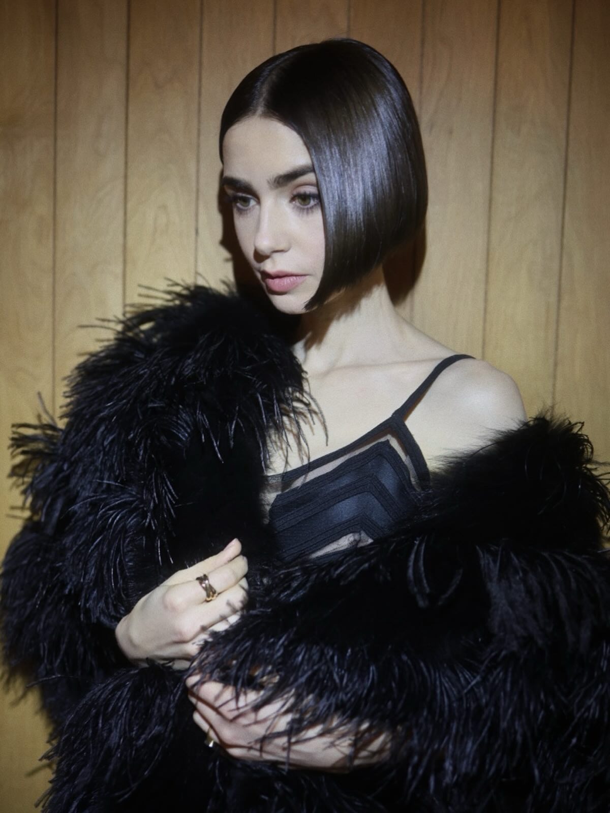 Lily Collins with a sleek bevelled bob