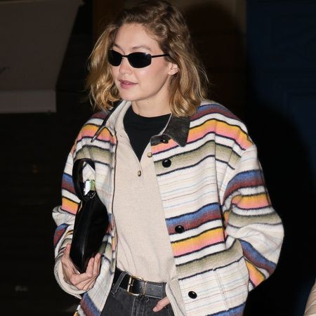 Gigi Hadid wearing a striped jacket in Paris