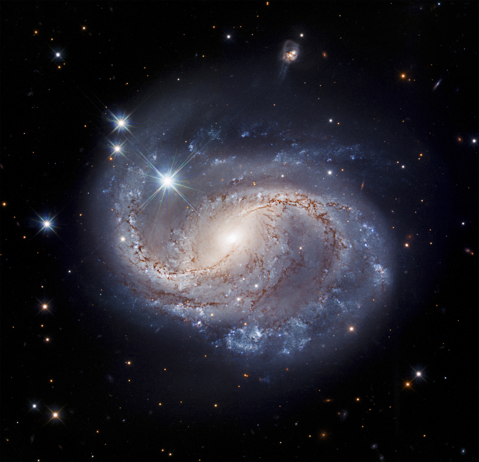 A photo taken by the Hubble Space Telescope of the spiral galaxy NGC 6956.