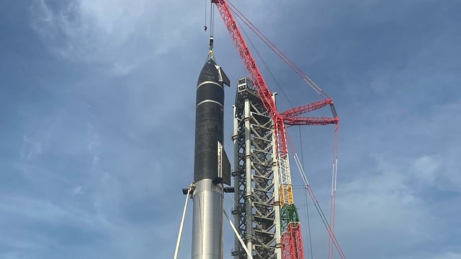 SpaceX stacks its SN20 Starship prototype atop its Super Heavy booster for the first time at the company&#039;s Starbase facility in South Texas in August 2021.