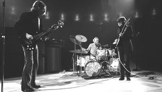 (from left) Jack Bruce, Ginger Baker, and Eric Clapton perform onstage at Madison Square Garden in New York City on November 2, 1968