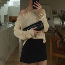 Anouk Yve in a Banana Republic sweater and skirt