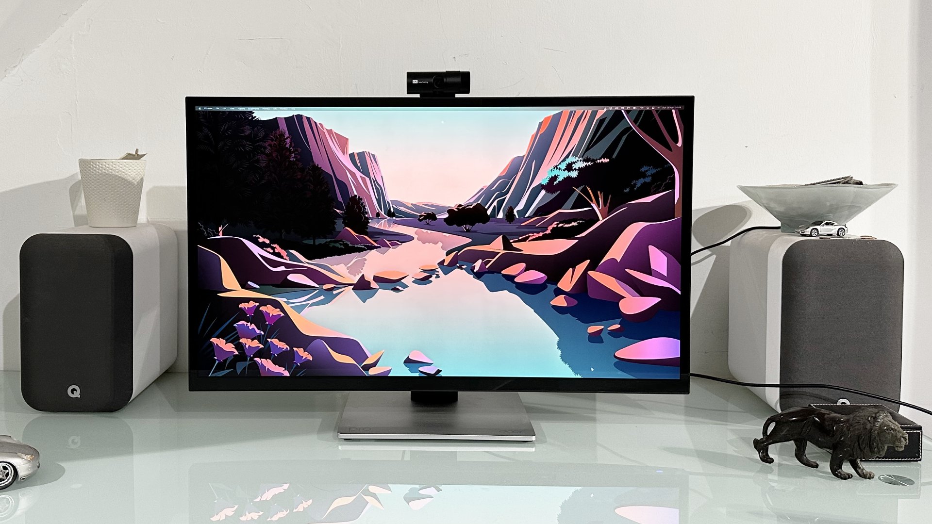 The Acer ProCreator PE320QXT on a desk in a home office during our testing process