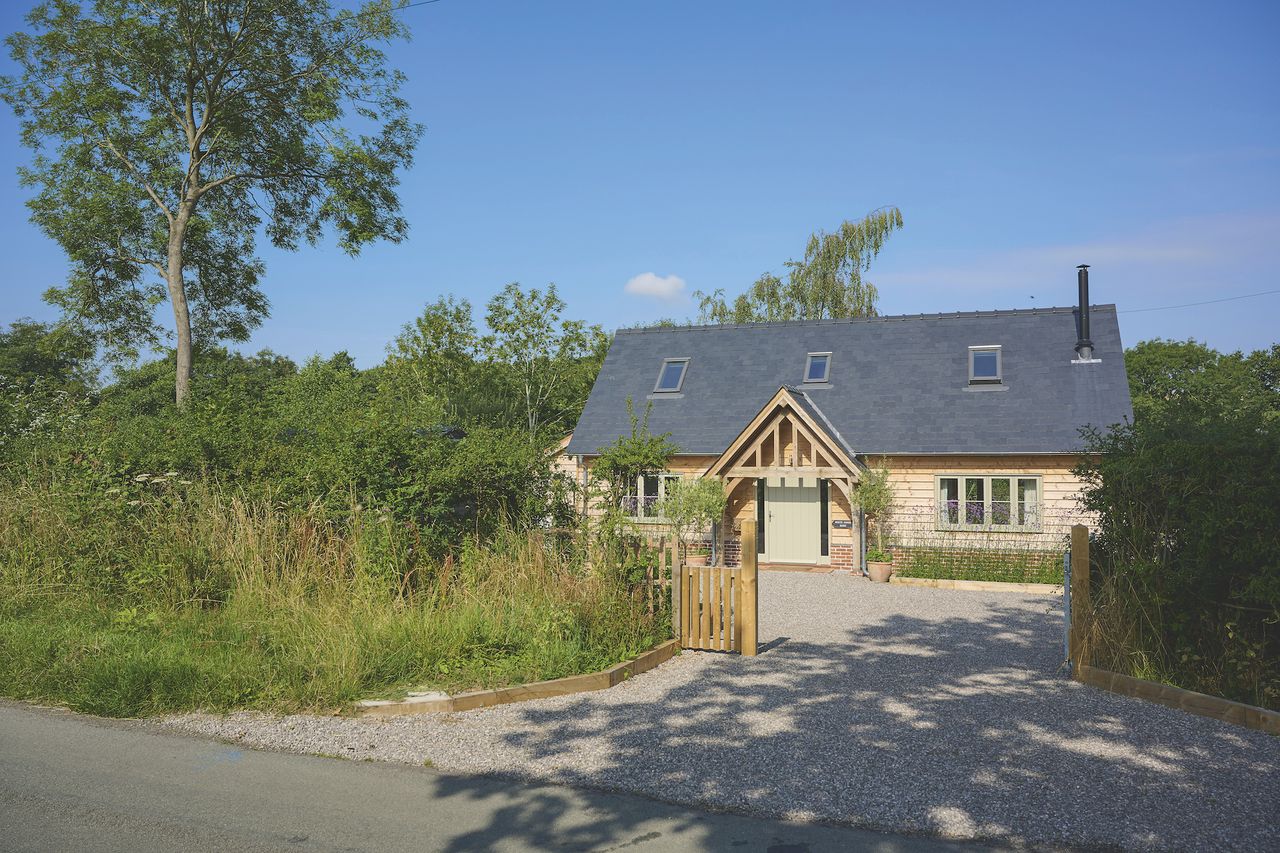 timber clad oak framed small cottage
