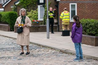 Evelyn Plummer clocks Hope&#039;s face when the fire safety officer arrives.