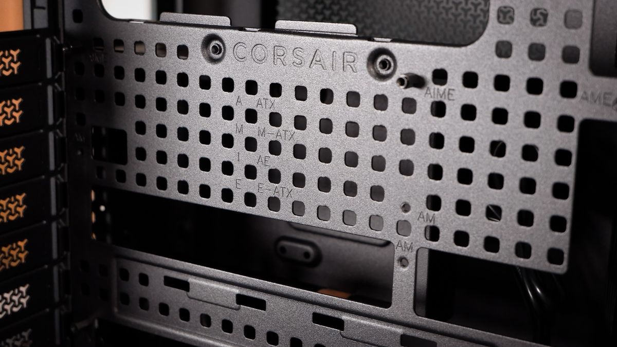 A Corsair Air 5400 PC case on a desk with various parts installed.
