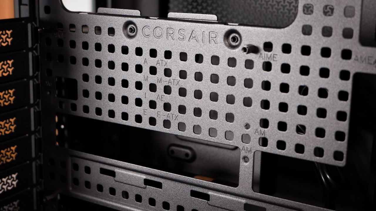 A Corsair Air 5400 PC case on a desk with various parts installed.