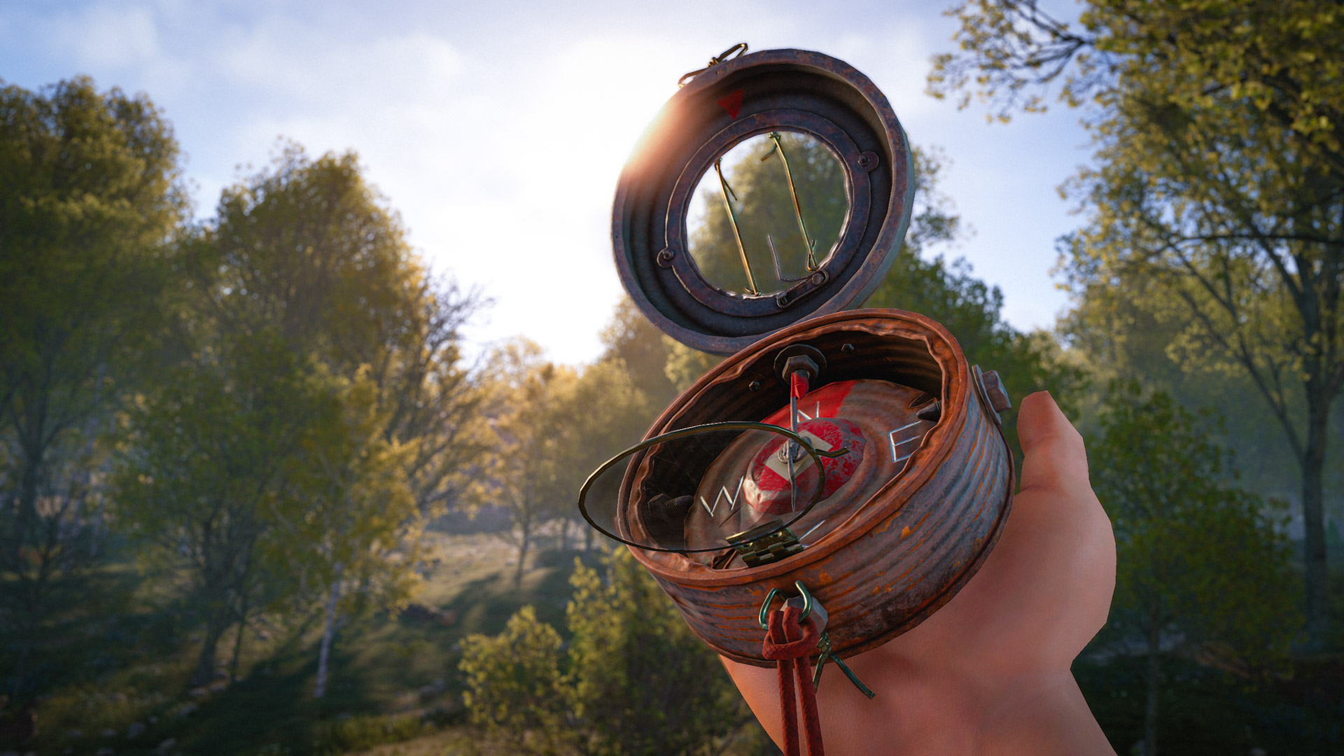 The player holds up a handcrafted compass in a forest in Rust