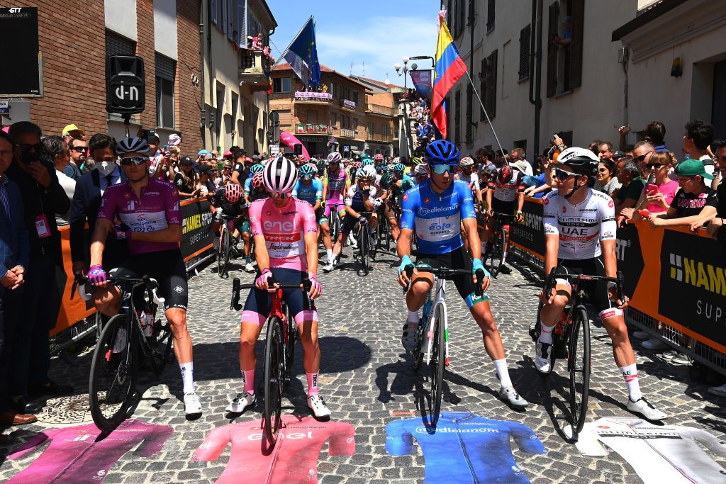 TURIN ITALY MAY 21 LR Arnaud Demare of France and Team Groupama FDJ Purple Points Jersey Juan Pedro Lpez of Spain and Team Trek Segafredo Pink Leader Jersey Diego Rosa of Italy and EoloKometa Cycling Team Blue Mountain Jersey and Joo Almeida of Portugal and UAE Team Emirates White Best Young Rider Jersey the 105th Giro dItalia 2022 Stage 14 a 147km stage from Santena to Torino Giro WorldTour on May 21 2022 in Turin Italy Photo by Tim de WaeleGetty Images