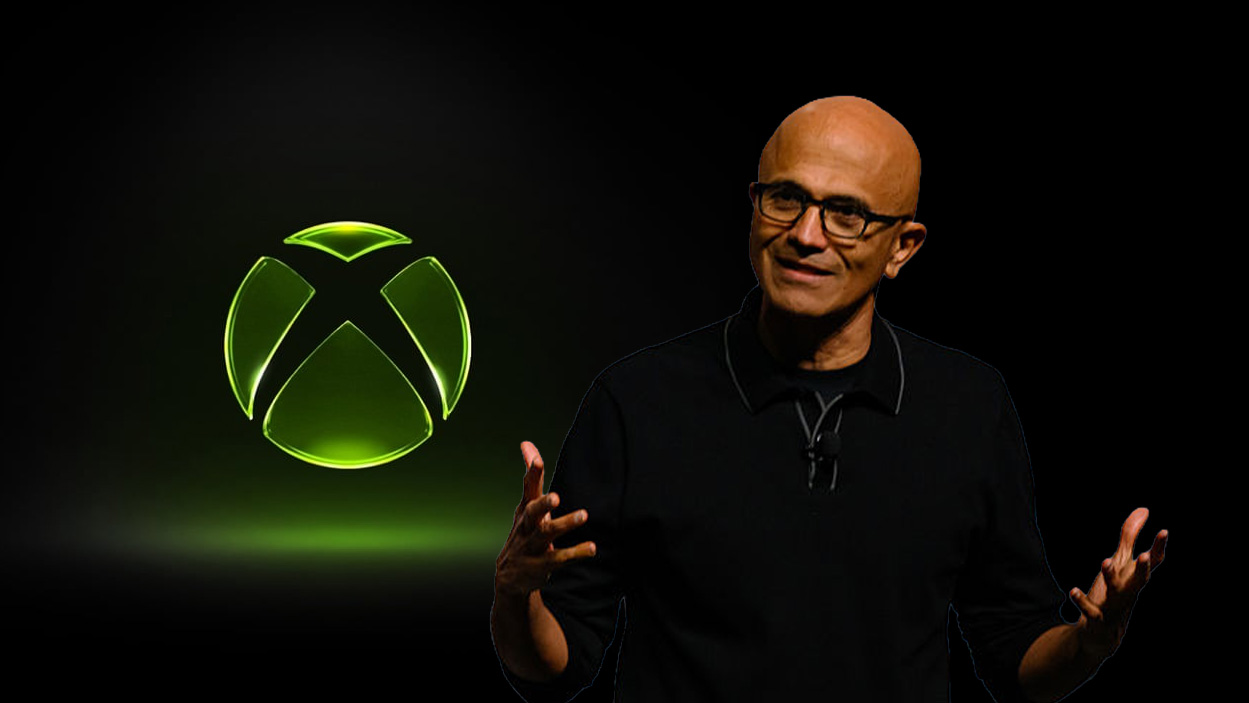 Satya Nadella with an Xbox logo in the background