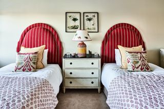 country bedroom with twin upholstered beds