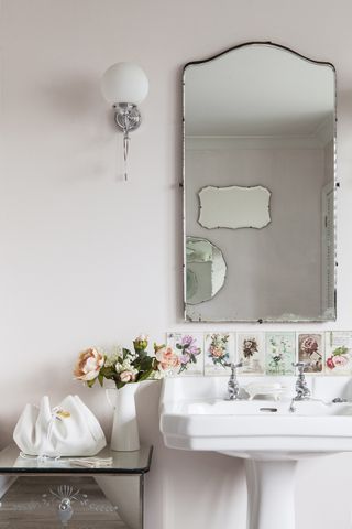 Mirror and cabinet detail in period home