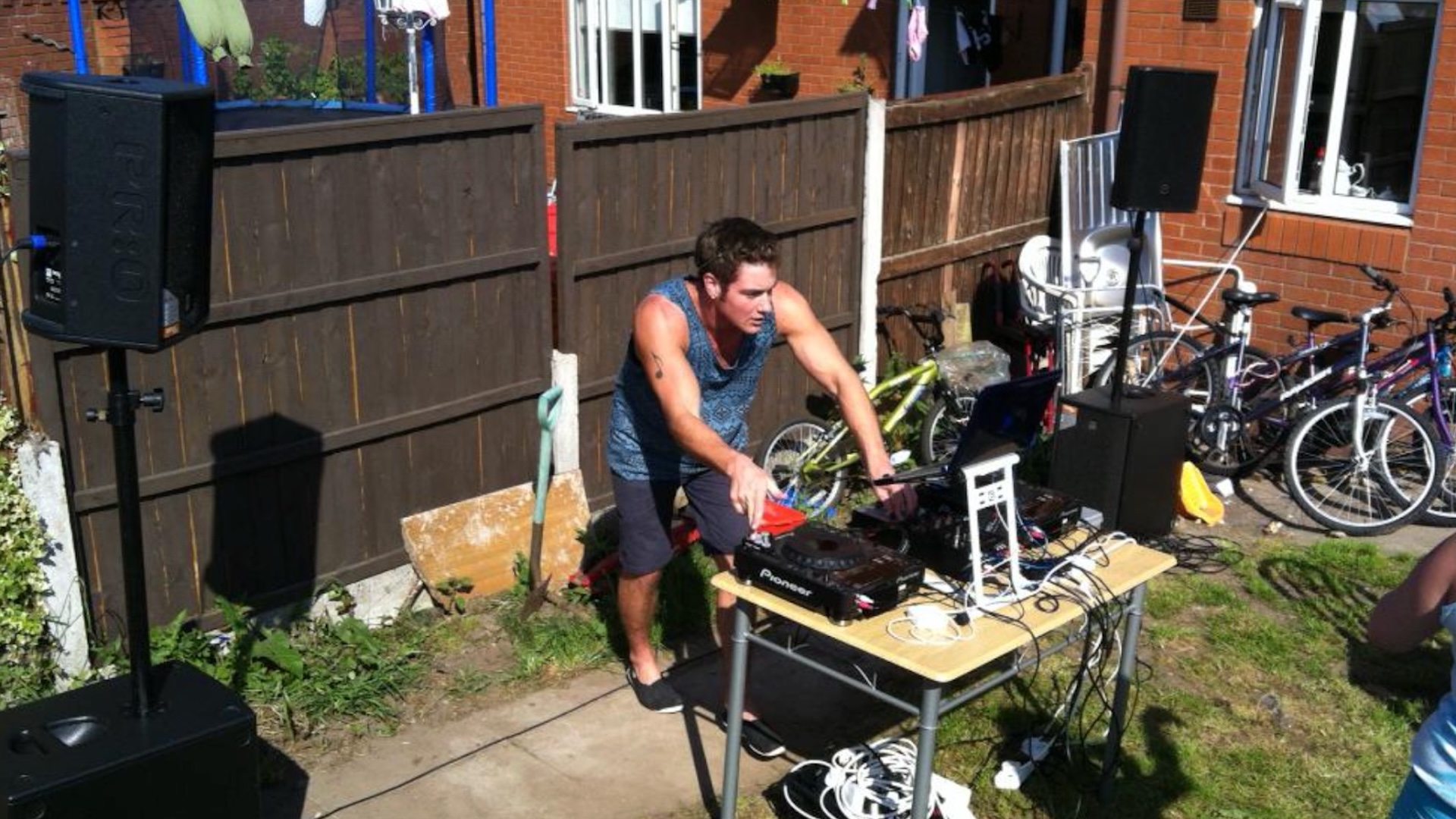 James Hype DJ in a garden 