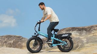 Man riding Heybike Mars 2.0 in desert