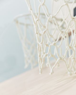 Close up of the silk and cotton hand tied basketball net
