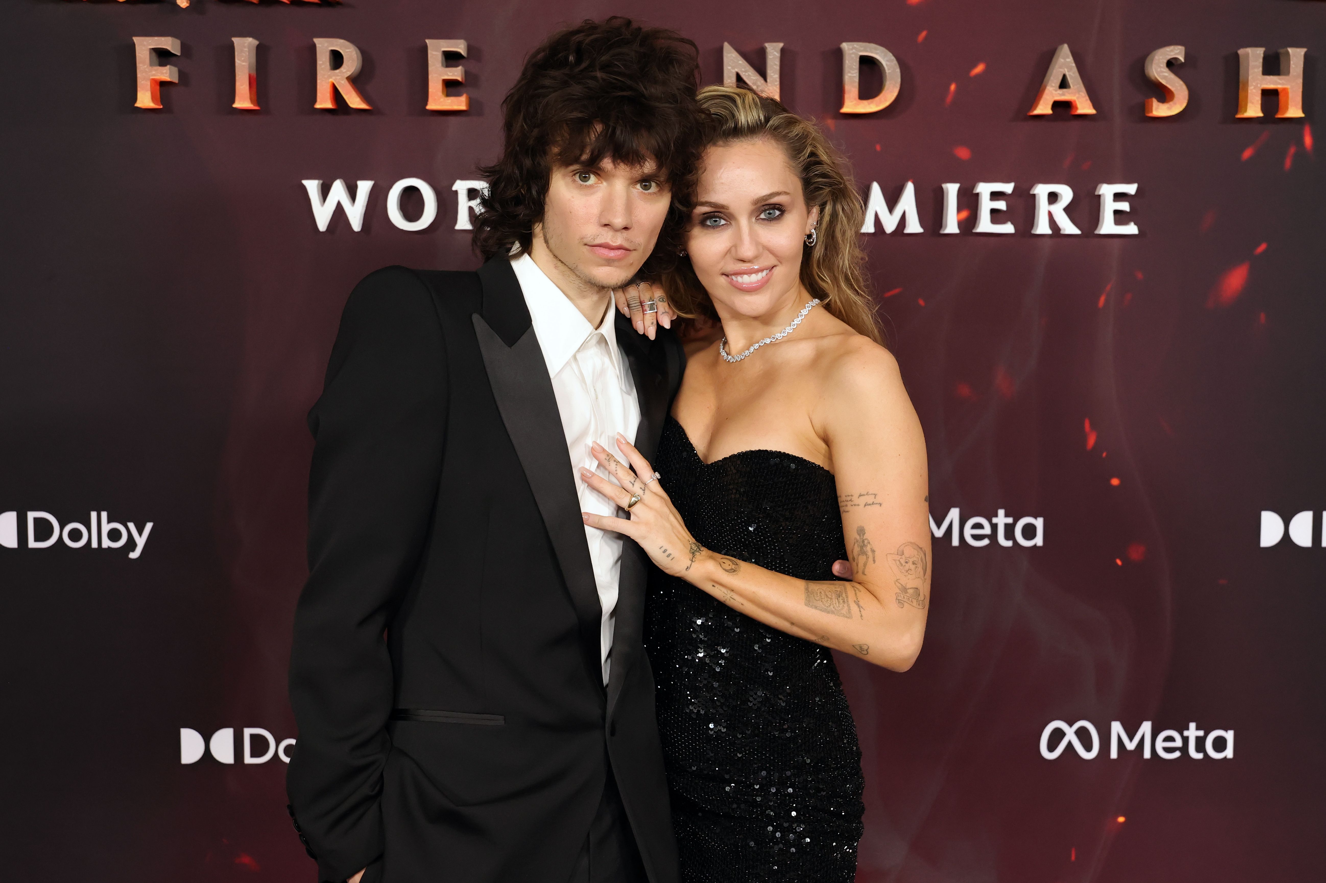 HOLLYWOOD, CALIFORNIA - DECEMBER 01: (L-R) Maxx Morando and Miley Cyrus attend the Global Premiere of 20th Century Studios&amp;amp;apos; "Avatar: Fire And Ash" at Dolby Theatre on December 01, 2025 in Hollywood, California. (Photo by Kevin Winter/WireImage)