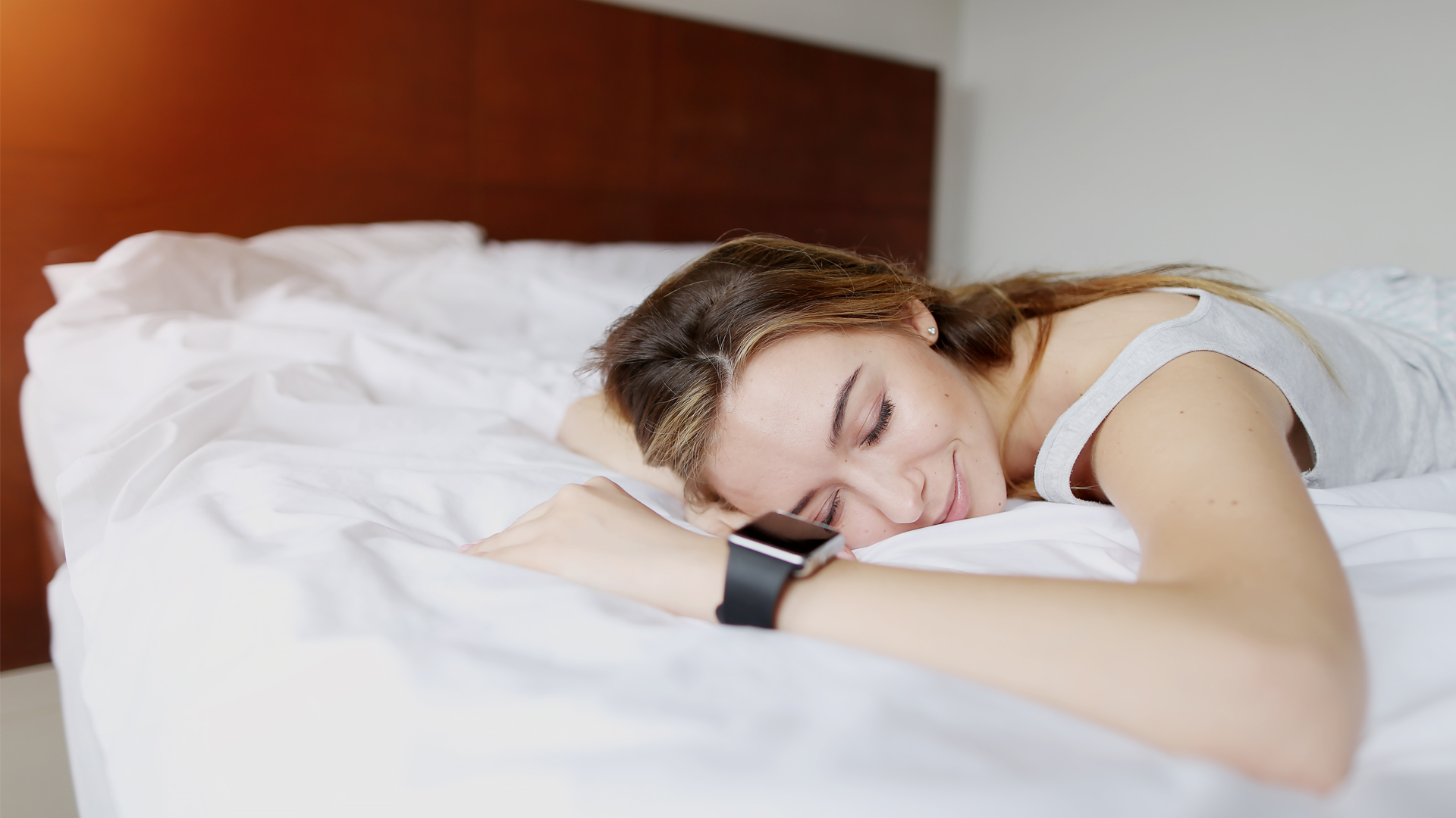 Woman wearing tracker while sleeping
