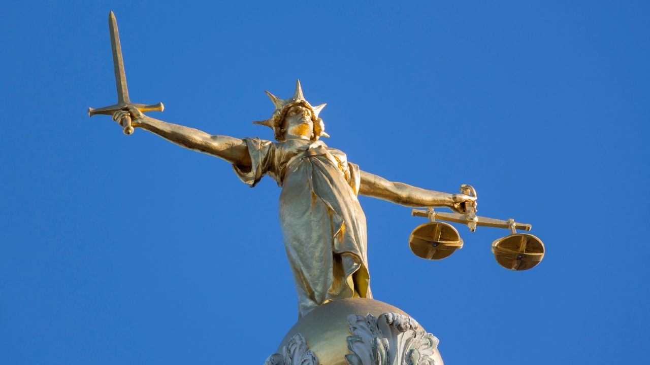 Statue of Justice at the Old Bailey in London