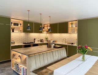 green kitchen with illuminated cabinets